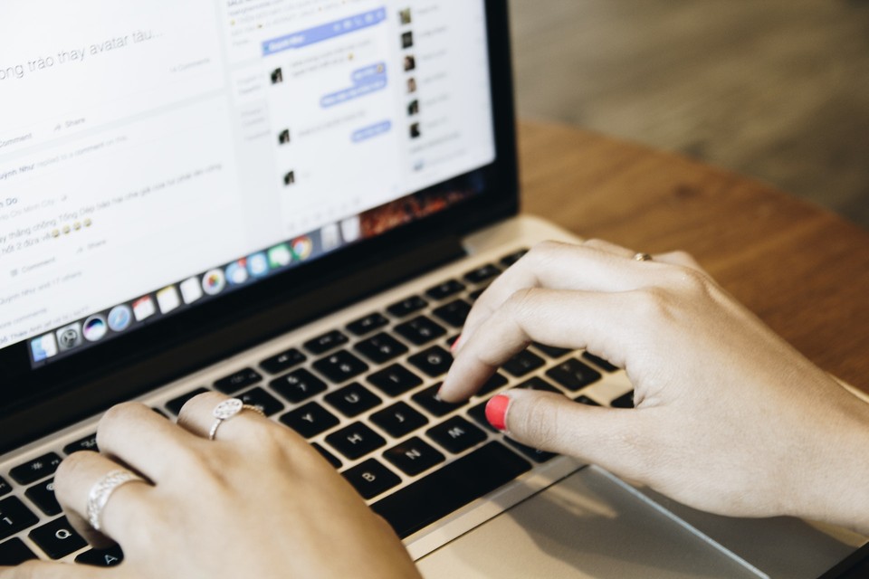 Person typing on a laptop