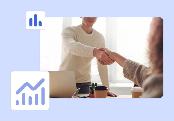Two people shaking hands over a desk, representing API access request.